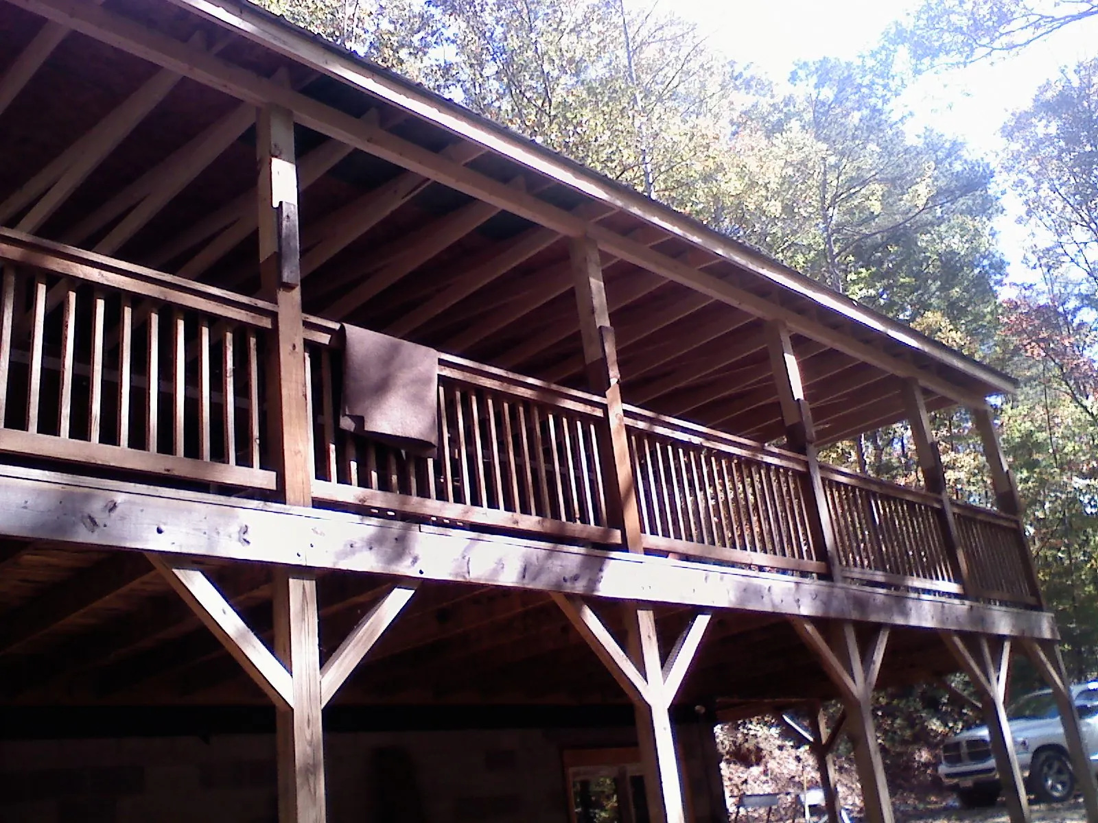 Timber framing under a new elevated porch and deck — Roof Leak Repair in Rock Creek by Roofing Brothers